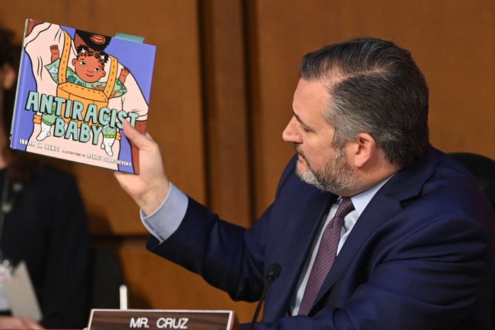 Sen. Ted Cruz (R-Texas) holds a book titled "Antiracist Baby" while speaking during the confirmation hearing for Judge Ketanji Brown Jackson, a nominee to the U.S. Supreme Court.