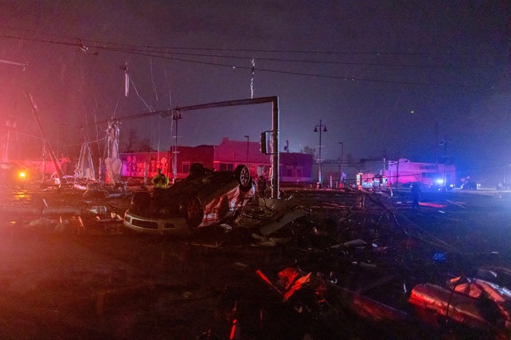 A car lies overturned amid debris after a tornado struck in the Arabi neighborhood, St. Bernard Parish, New Orleans, Louisiana March 22, 2022.