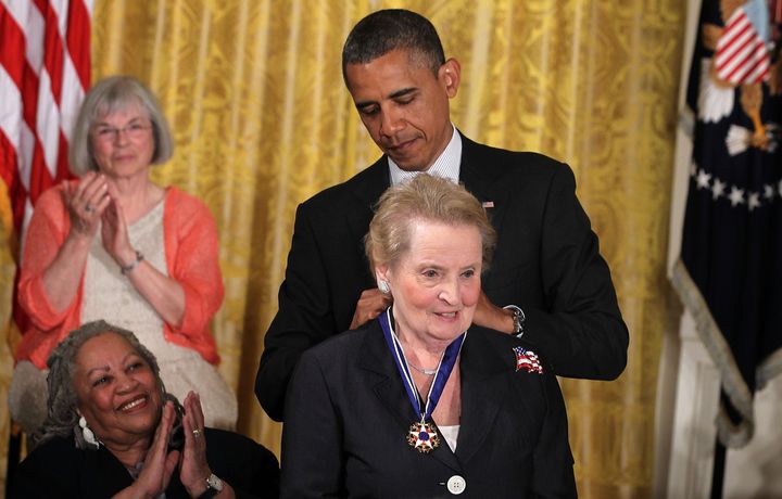 Former U.S. Secretary of State Madeleine Albright is presented with a Presidential Medal of Freedom by President Barack Obama during an East Room event on May 29, 2012, at the White House in Washington, D.C.
