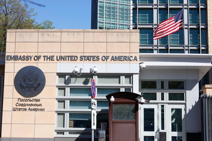 The U.S. Embassy and the National flag are seen in Moscow, Russia, Tuesday, May 11, 2021. Under Kremlin orders, the U.S. Embassy has stopped employing Russians, leaving Russian businessmen, lovers and exchange students adrift because they can't get visas and American parents unable to register their newborns as citizens. (AP Photo/Alexander Zemlianichenko)