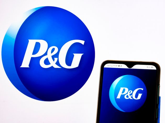 UKRAINE - 2021/05/21: In this photo illustration, a Procter & Gamble Company, P&G, logo seen displayed on a smartphone and in the background. (Photo Illustration by Igor Golovniov/SOPA Images/LightRocket via Getty Images)