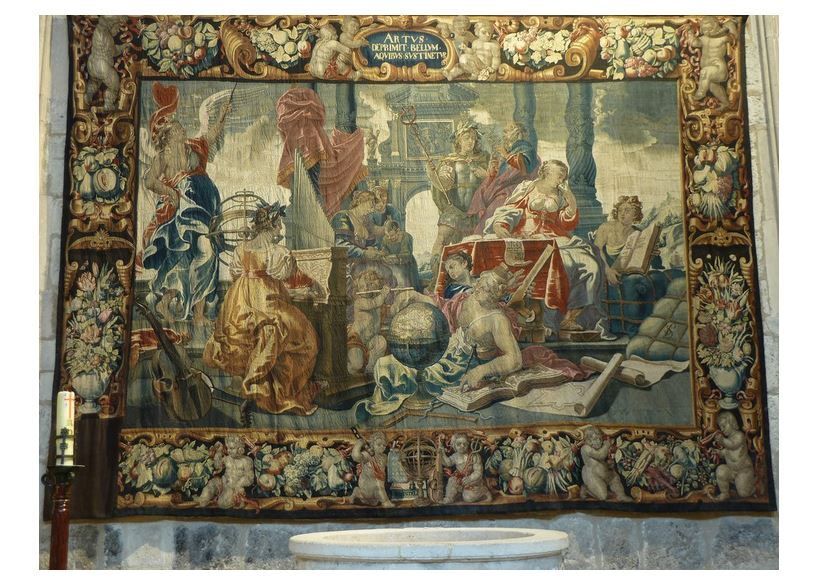 Η φλαμανδική ταπισερί του 17ου αιώνα, με τίτλο «Η Αποθέωση των Τεχνών», είναι η μεγαλύτερη από μια σειρά έξι ταπισερί που εκλάπη από την εκκλησία του Αγίου Δομίνικου στο Καστρογερίζ της Ισπανίας το 1980. Το κομμάτι που έλειπε είναι στην κάτω αριστερή γωνία. Public domain via Wikimedia Commons