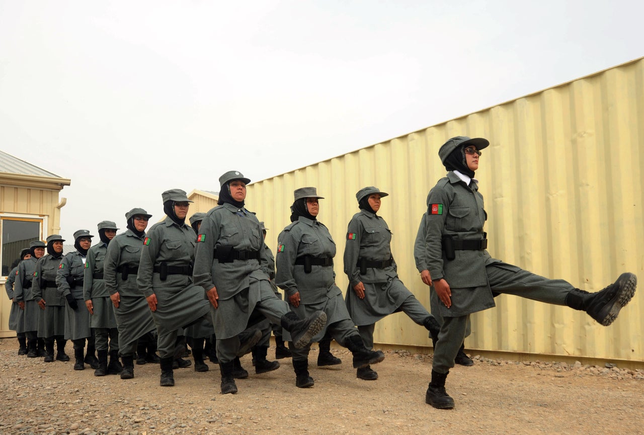 Afghan policewomen march during a graduation ceremony at a police training center in Herat on March 15, 2012.