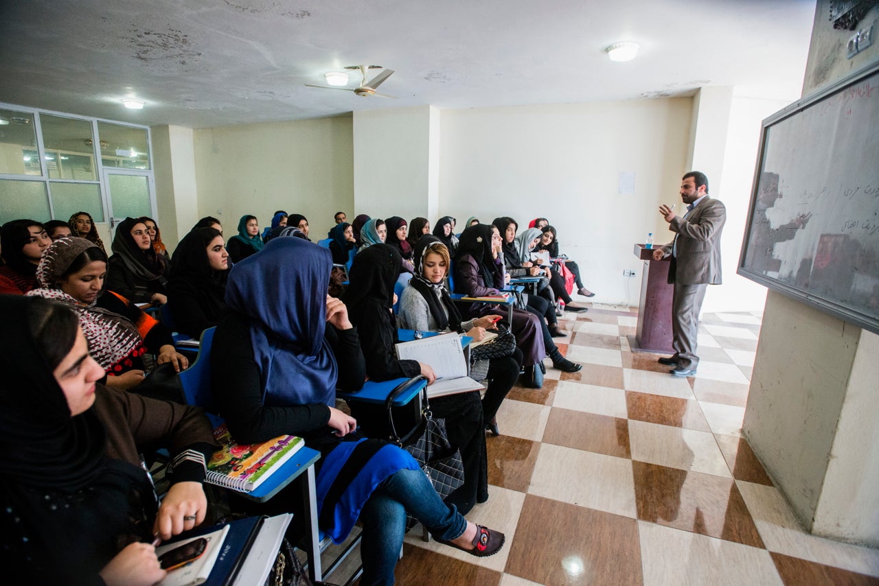 Female law class in Mashal institute of higher education, Kabul, Afghanistan. Since 2002, the end of the first Taliban era in Afghanistan, the number of female students increased from zero to almost 15,000.