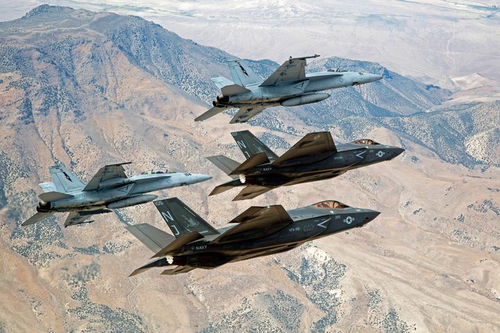 In this Sept. 3, 2015, photo fighter jets fly over Naval Air Station Fallon's training complex near Fallon, Nevada. The Navy has proposed tripling the size of the training and bombing complex to approximately 900,000 acres, but that effort is currently on hold.