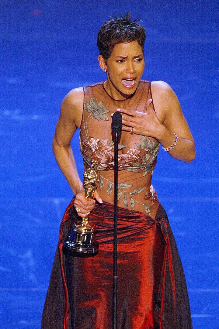 Halle Berry accepts her Best Actress Oscar during the 74th Academy Awards in 2002.