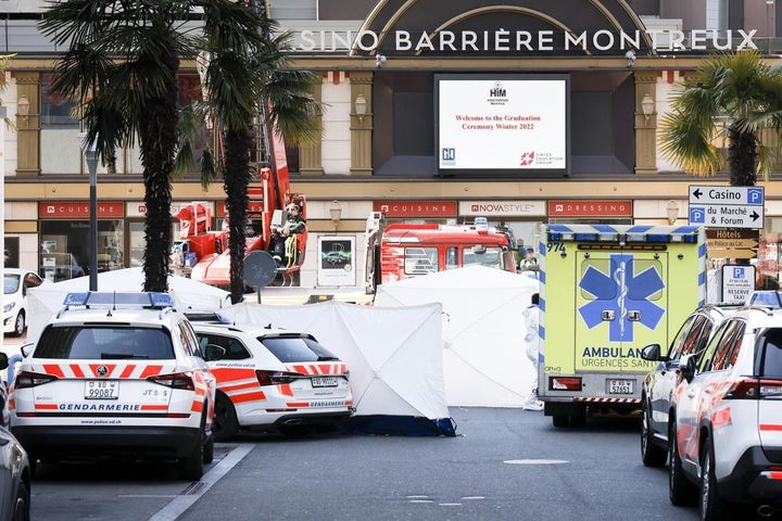 Cars and tents block a road in Montreux, Switzerland on March 24. Swiss police say four people have been found dead at the foot of a building in Montreux, with a fifth person hospitalized in serious condition.