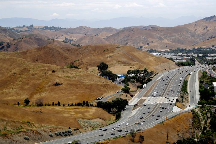 U.S. Highway 101 passes between two separate open space preserves on conservancy lands in the Santa Monica Mountains in Agoura Hills, Calif., July 25, 2019. 