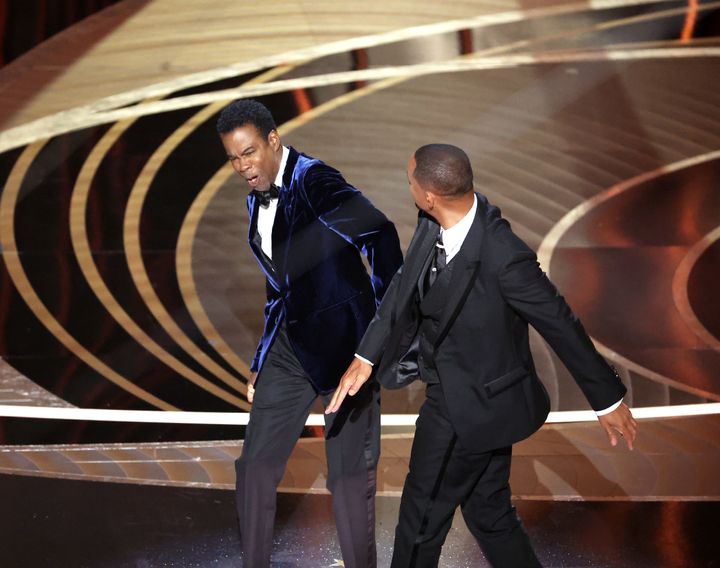 Chris Rock and Will Smith pictured on stage during the Oscars