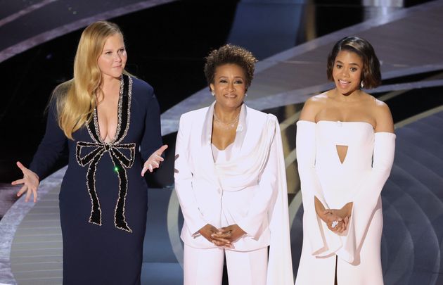 Amy Schumer, Wanda Sykes, and Regina Hall on stage at the Oscars