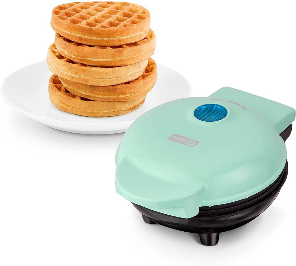 The Dash mini waffle maker with over 158,000 five-star reviews