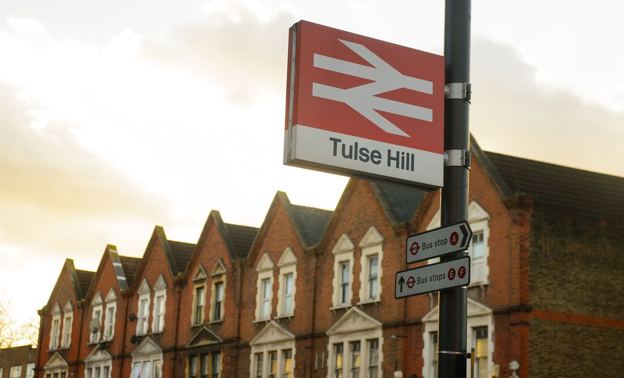 Sign outside the rail station in Tulse Hill, in south London. (Photo by Dominic Lipinski/PA Images via Getty Images)