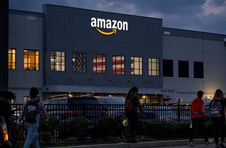 People arrive for work at JFK8, the Amazon fulfillment center on Staten Island, New York, where workers voted to unionize.