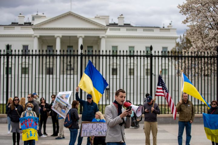 Members of United Help Ukraine and other activists hold a rally outside the White House on March 20.