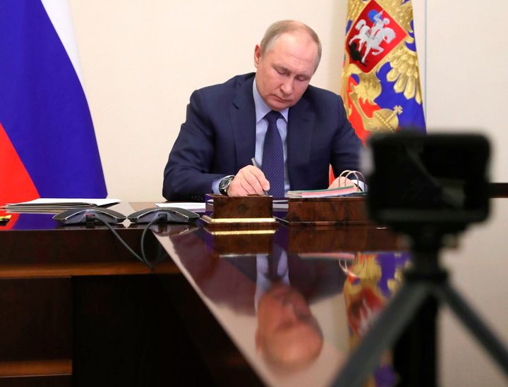 Russian President Vladimir Putin attends a meeting via videoconference in Moscow, Russia, on March 25, 2022.