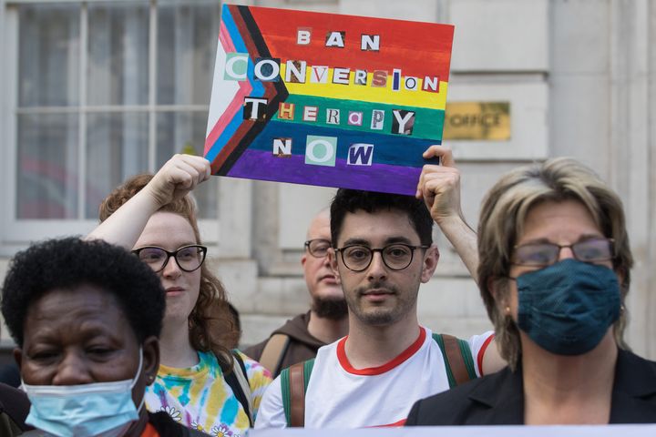 Campaigners against LGBT+ conversion therapy attend a picket outside the Cabinet Office and Government Equalities Office on 23rd June 2021. (photo by Mark Kerrison/In Pictures via Getty Images)