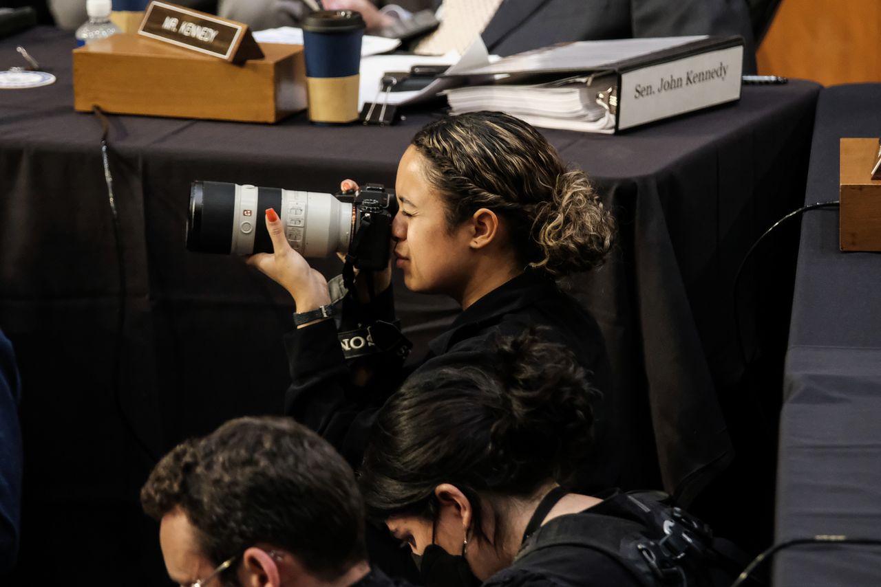 Photojournalist Sarabeth Maney works during Jackson's confirmation hearings on Capitol Hill.