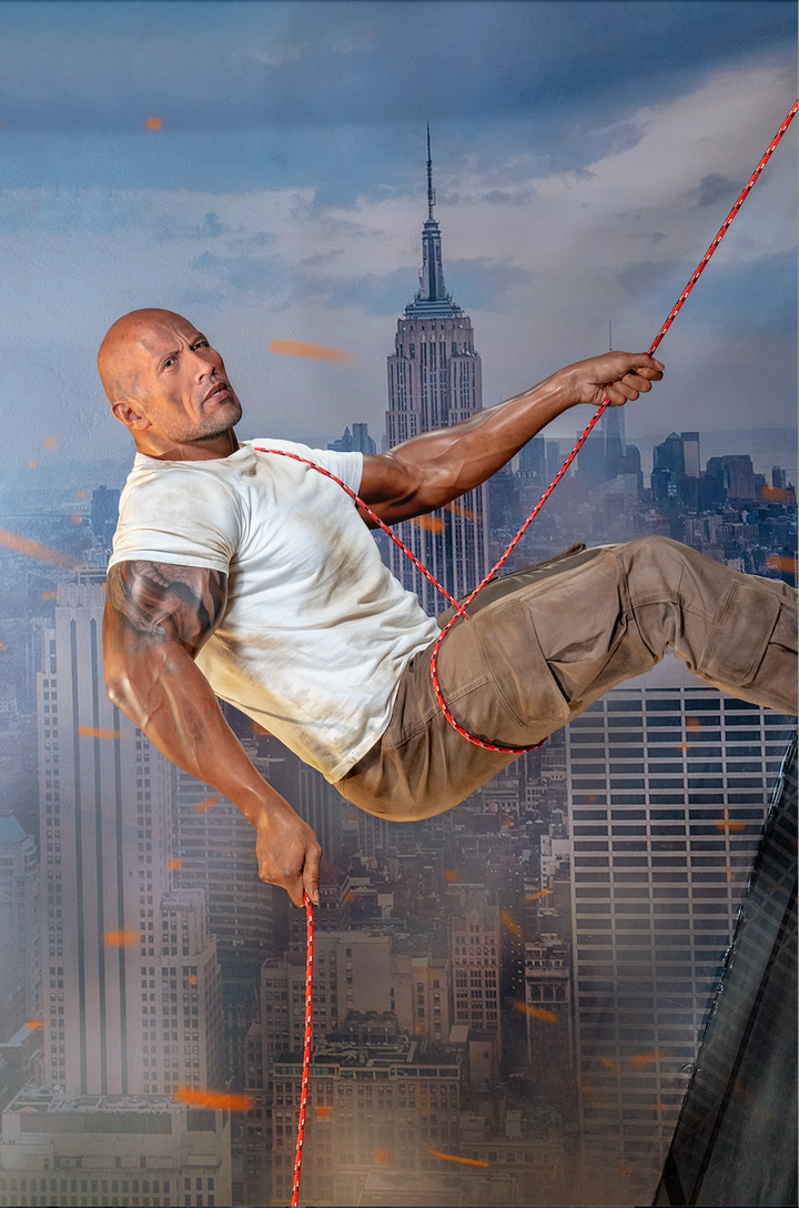 Dwayne Johnson Is Now A Wax Figure, And It's Actually Kind Of Creepy 8 The Rock statue at Madame Tussauds Orlando.