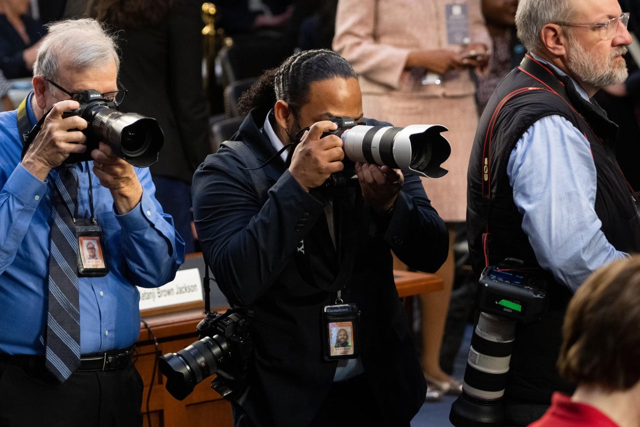 Jarrad Henderson photographs Jackson's hearing.