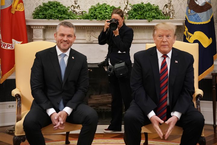 White House chief photographer Shealah Craighead (centers) takes photographs of Donald Trump (right) and Slovak Republic Prime Minister Peter Pellegrini in 2019.
