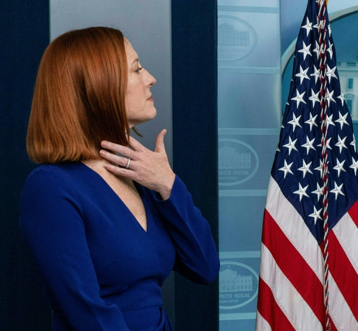White House press secretary Jen Psaki gets ready to speak at the White House on Friday.