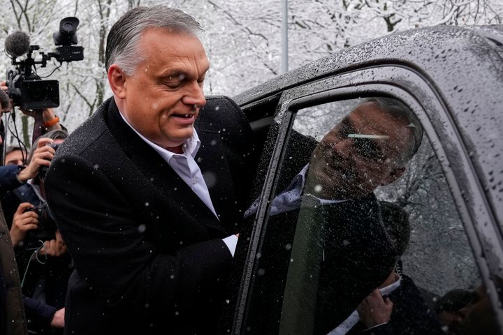 Hungary's nationalist prime minister,Viktor Orban leaves after casting his vote for general election in Budapest, Hungary, Sunday, April 3, 2022. Orban seeks a fourth straight term in office, a coalition of opposition parties are framing the election as a referendum on Hungary's future in the West. (AP Photo/Petr David Josek)