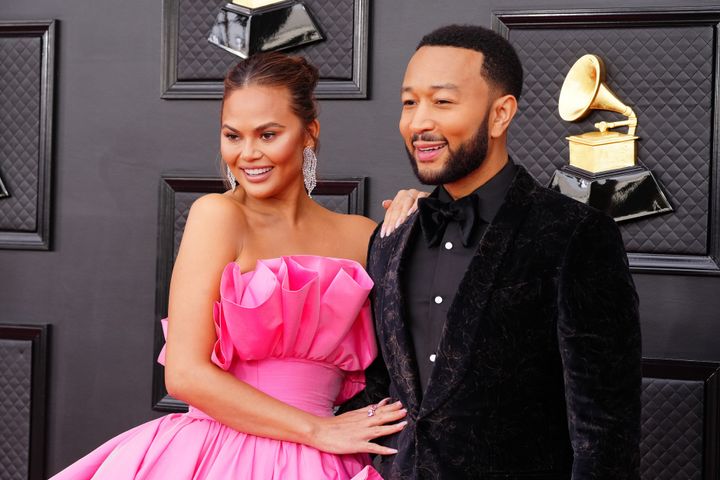 The handsome couple arrives on the red carpet Sunday in Las Vegas.