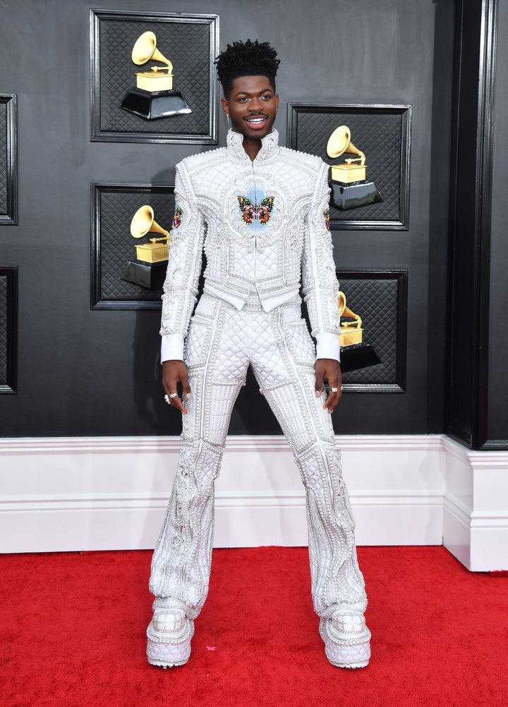 Lil Nas X's all-white two-piece ensemble was designed by Balmain.