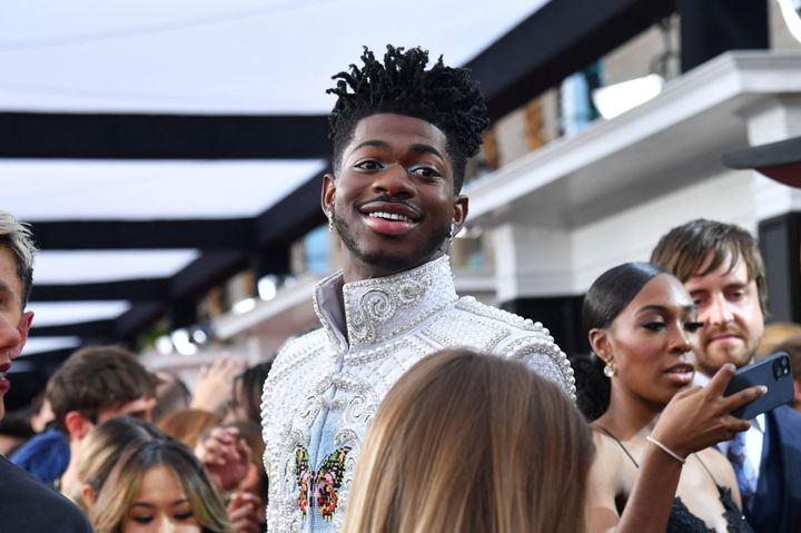 Lil Nas X appeared to tower over the crowd Sunday outside the MGM Grand Garden Arena in Las Vegas.
