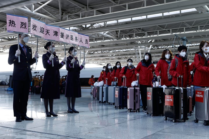 China has sent more than 10,000 health workers from across the country to Shanghai, including 2,000 military medical staff.