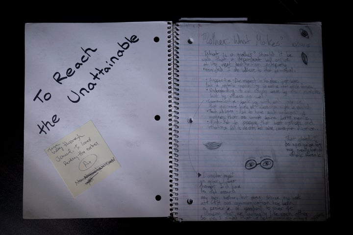 Taya Bruell's journal and a sticky note with a grade of A+ from her literature class teacher are photographed in Santa Barbara, Calif., on March 9, 2022. 