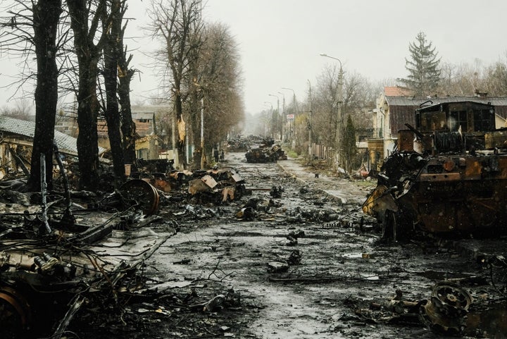 The view of a burnt and destroyed street in Bucha, a suburb north of Kyiv. As Russian troops withdraw from areas north of Ukraine's capital city of Kyiv, Ukrainian forces and the media found evidence of significant numbers of civilian casualties.