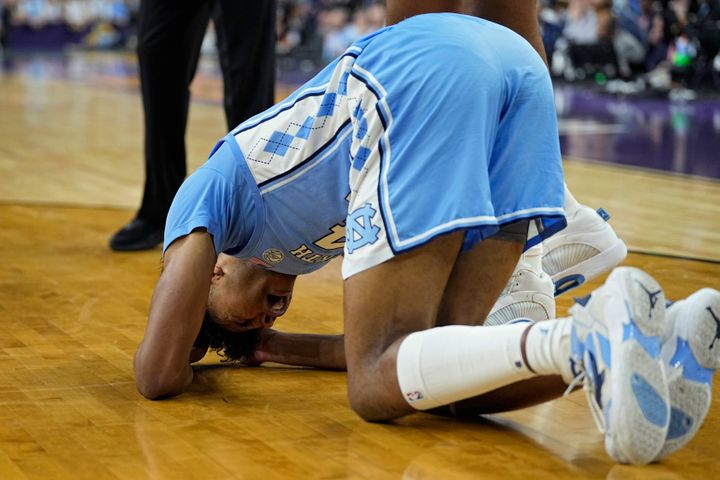 North Carolina guard Puff Johnson reacts during the second half of the Men's Final Four NCAA tournament against Kansas. 
