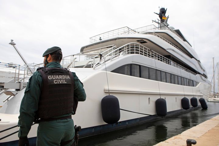 A Civil Guard stands by the yacht called the Tango in Palma de Mallorca, Spain on Monday.