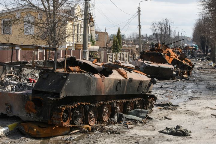 Street with destroyed Russian military machinery in the recaptured by the Ukrainian army Bucha city near Kyiv.
