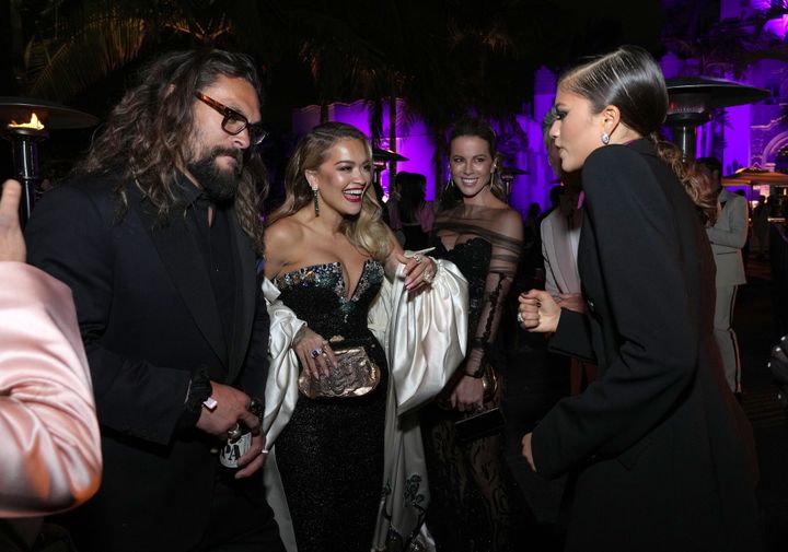 Jason Momoa and Kate Beckinsale (center background) are pictured in the vicinity of each other at the Vanity Fair Oscars afterparty.