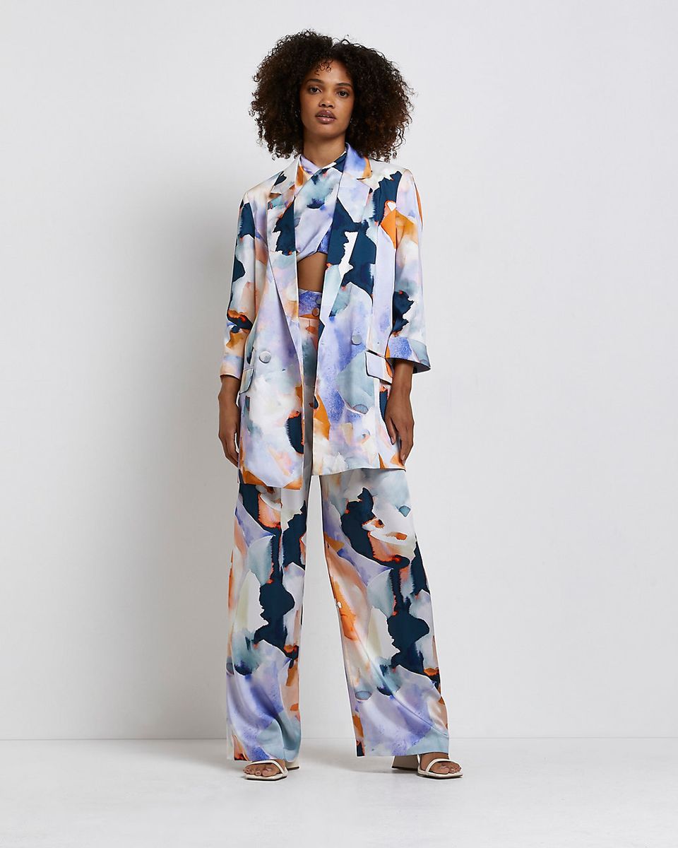 A cool suit with a watercolor pattern that's artsy but tailored
