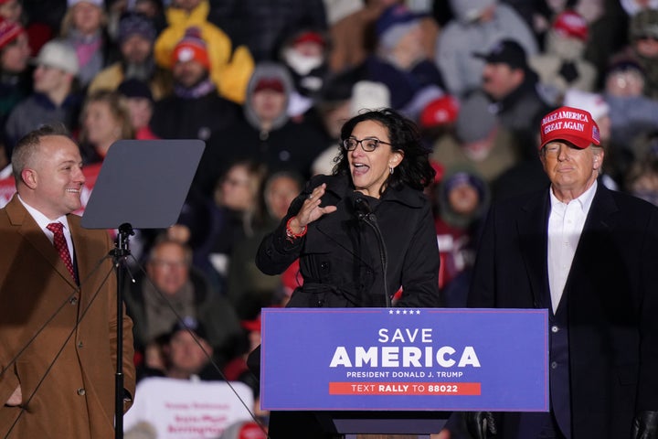 Katie Arrington, center, speaks at a Trump rally in South Carolina as former President Donald Trump looks on. She is running as a conservative who is more loyal to Trump than Mace.