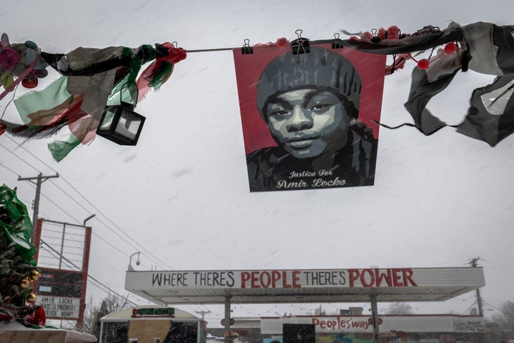 Amir Locke's picture is seen during a heavy snowstorm at George Floyd Square in Minneapolis, Minnesota, on February 22, 2022.