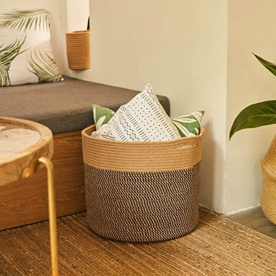 A versatile woven floor basket that can hold pillows, toys, plants and more
