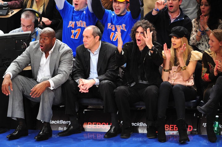 Magic Johnson and Howard Stern cheered one seat apart at a Knicks game on Feb. 29, 2012.