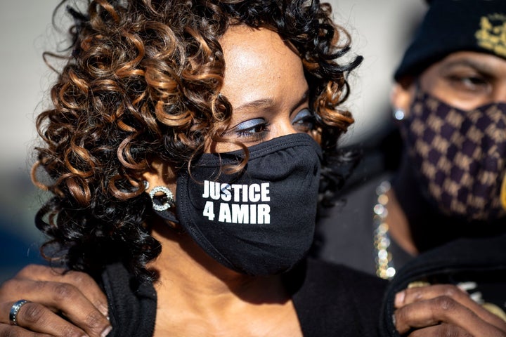 Karen Wells, mother of Amir Locke, looks on after the funeral of her son at the Shiloh Temple International Ministries in Minneapolis, February 17, 2022. - Members of the Minneapolis community gathered Thursday for the funeral of Amir Locke, a 22-year-old Black man who was killed by police during the execution of a no-knock warrant. (Photo by Kerem Yucel / AFP) (Photo by KEREM YUCEL/AFP via Getty Images)