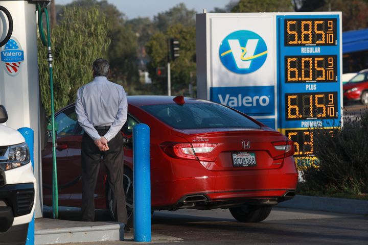 A motorist pumps gas at a Valero station in Encinitas, California, on April 5, 2022. In Southern California's 49th Congressional District, prices have soared above $6 a gallon.