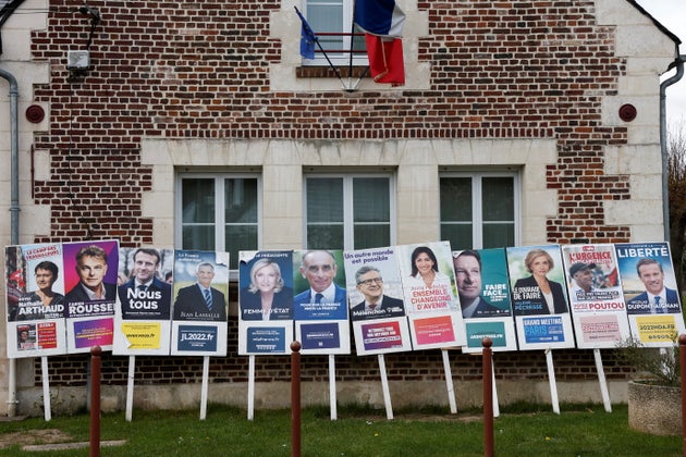 Official campaign posters of the 12 French presidential election candidates are seen on bulletin boards near the townhall in Appilly, France.