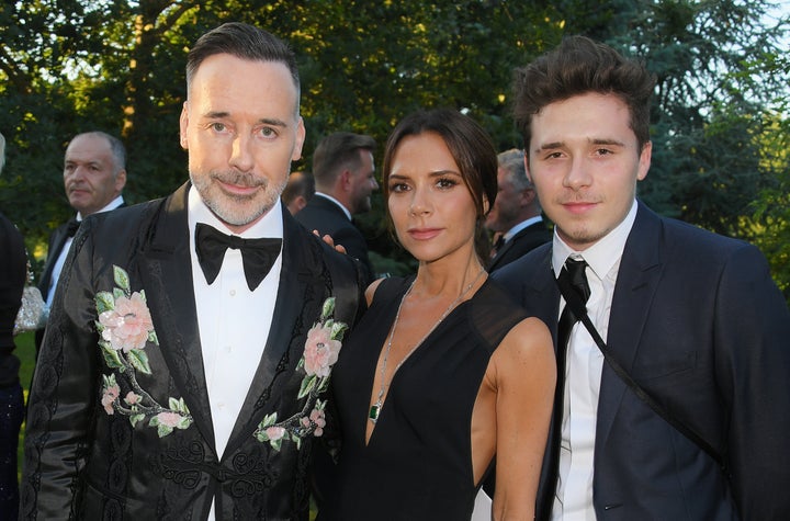 (L to R) David Furnish, Victoria Beckham and Brooklyn Beckham.
