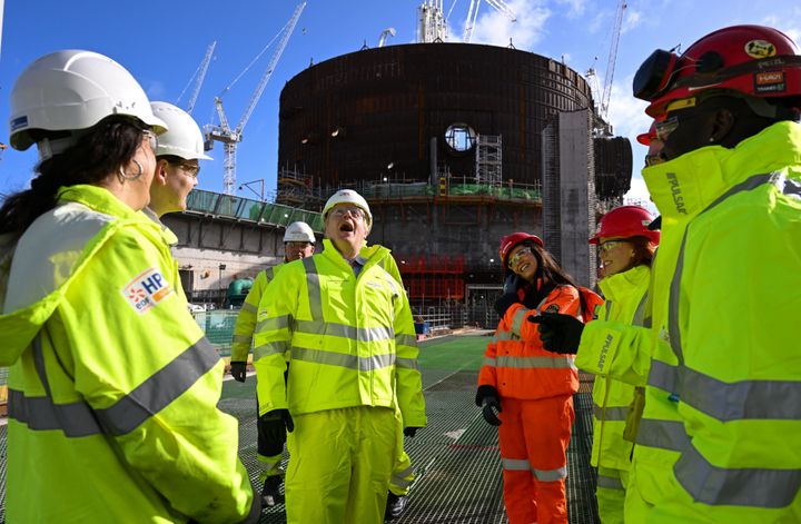 Boris Johnson meets apprentices during a visit to Hinkley Point C nuclear power station construction site in Somerset. Picture date: Thursday April 7, 2022.