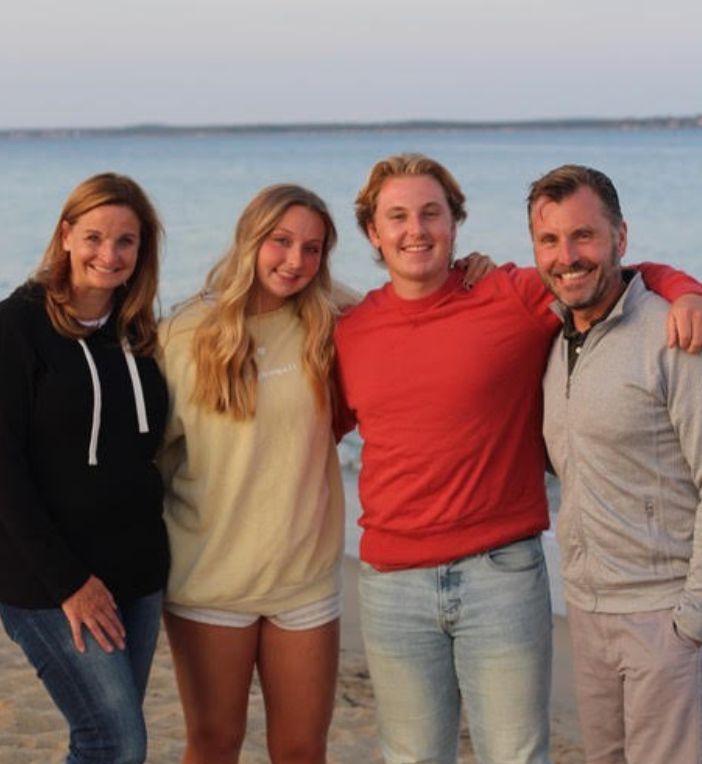 The author with her husband, Chris, daughter, Lily, and son, Will, at a beach in Maine in 2021.