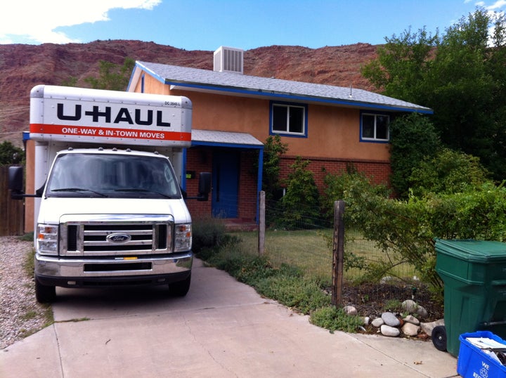 The author's old house on moving day. "Most younger adults are shocked to find that I live with my parents, while older adults usually find it delightful. All are curious about how this could possibly work," she writes.