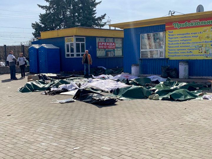 Casualties are laid out next to a platform after a bombing of the railway station in the eastern city of Kramatorsk in the Donbass region on Friday.