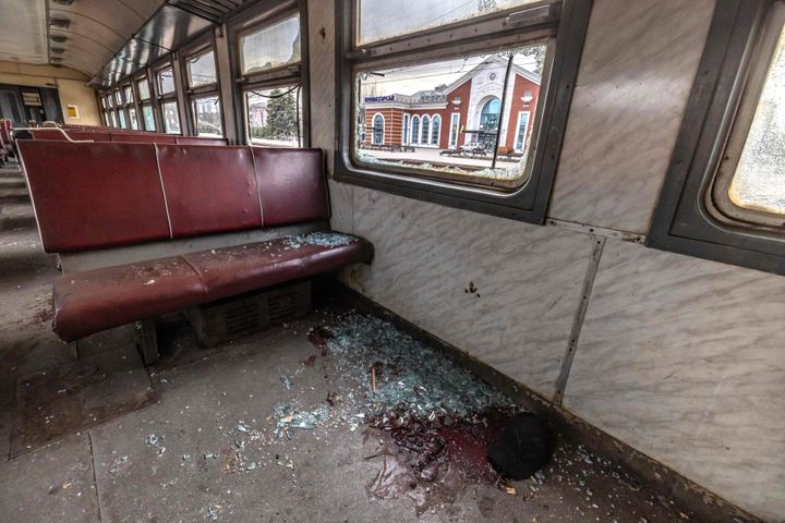 EDITORS NOTE: Graphic content / This photograph taken on April 8, 2022 shows a train car after a rocket attack at a train station in Kramatorsk, eastern Ukraine, that was being used for civilian evacuations. - A rocket attack on a train station in the eastern Ukrainian city of Kramatorsk killed dozens on April 8, 2022 as civilians raced to flee the Donbas region bracing for a feared Russian offensive. Fifty people were killed, including five children, the regional governor of Donetsk, Pavlo Kyrylenko, said as the toll rose on one of the deadliest strikes of the six-week-old war. (Photo by FADEL SENNA / AFP) (Photo by FADEL SENNA/AFP via Getty Images)